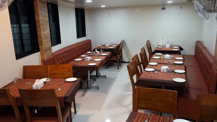 AC dining hall seating at आमची Seafood Restaurant